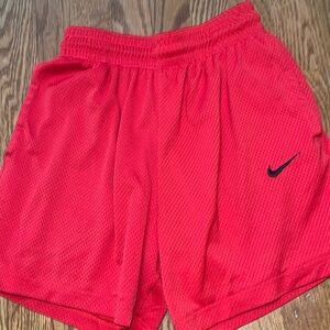 Men’s size small red Nike mesh shorts with pockets